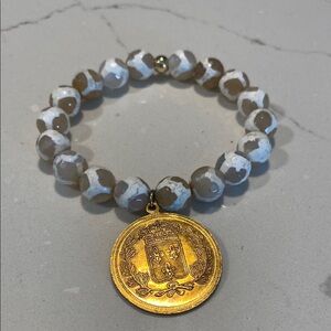 Love Poppy Tan and White Beaded Bracelet with Medallion